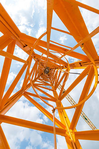construction crane from the base looking up